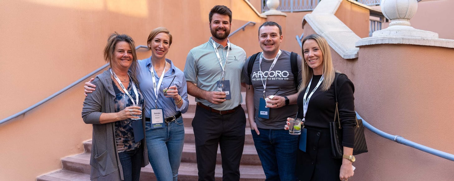 Arcoro Elevate conference attendees networking and socializing during a construction HR event.